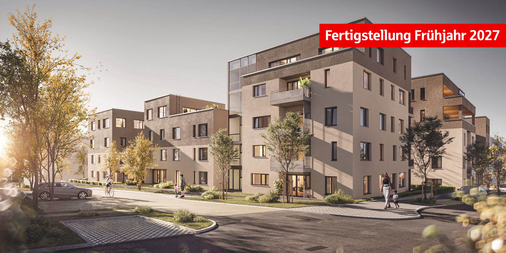 Moderne Wohnanlage mit mehreren Gebäuden und Wohnungen. Menschen gehen durch die gepflegte Außenanlage mit Bäumen und gepflasterten Wegen.
